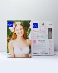 Key My First Bra TBC 122 stanik dla nastolatek z ozdobą i odpinanymi ramiączkami - beżowy